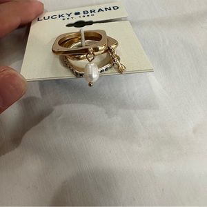 New, Lucky Brand three-piece gold ring set